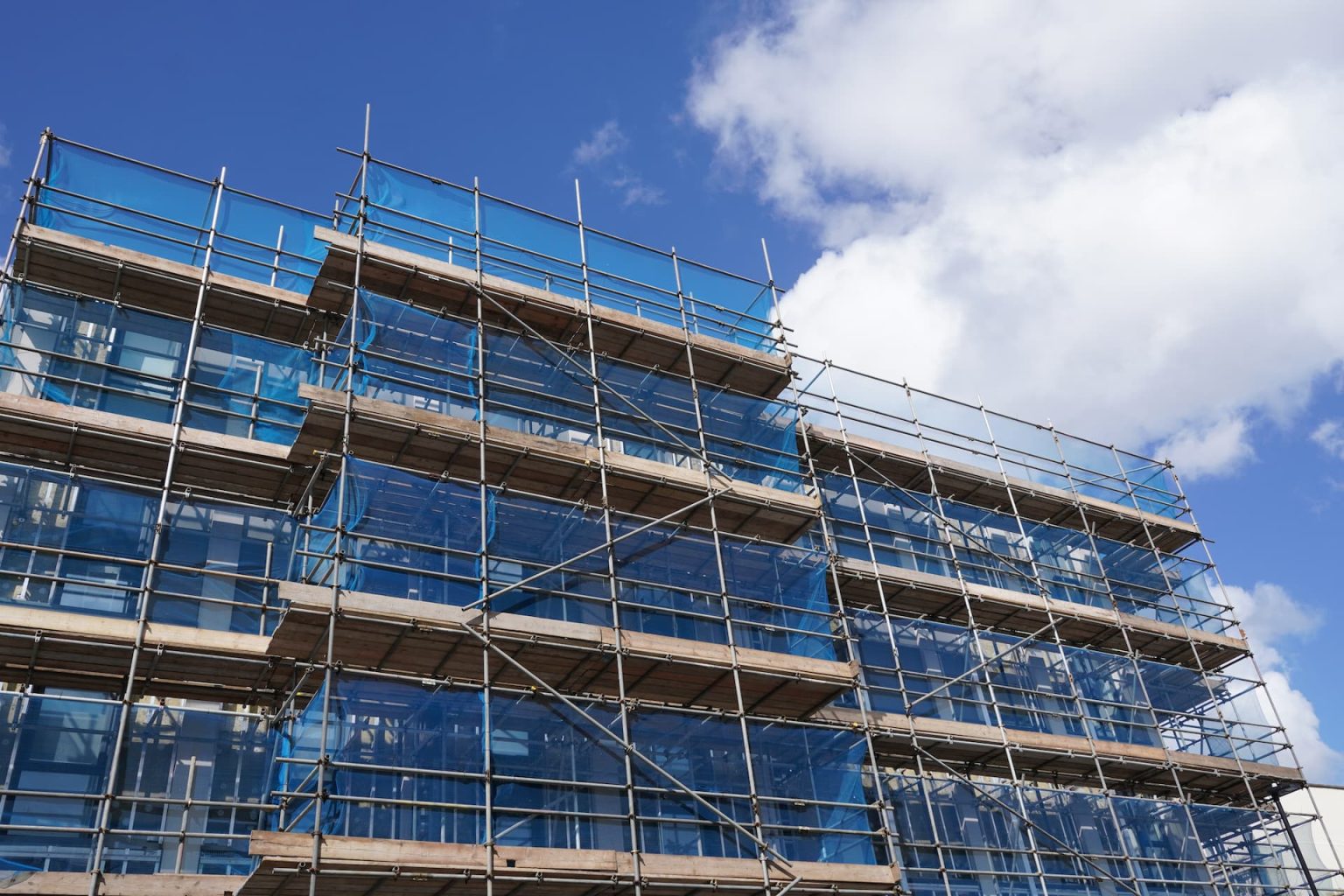 a building under construction with scaffolding