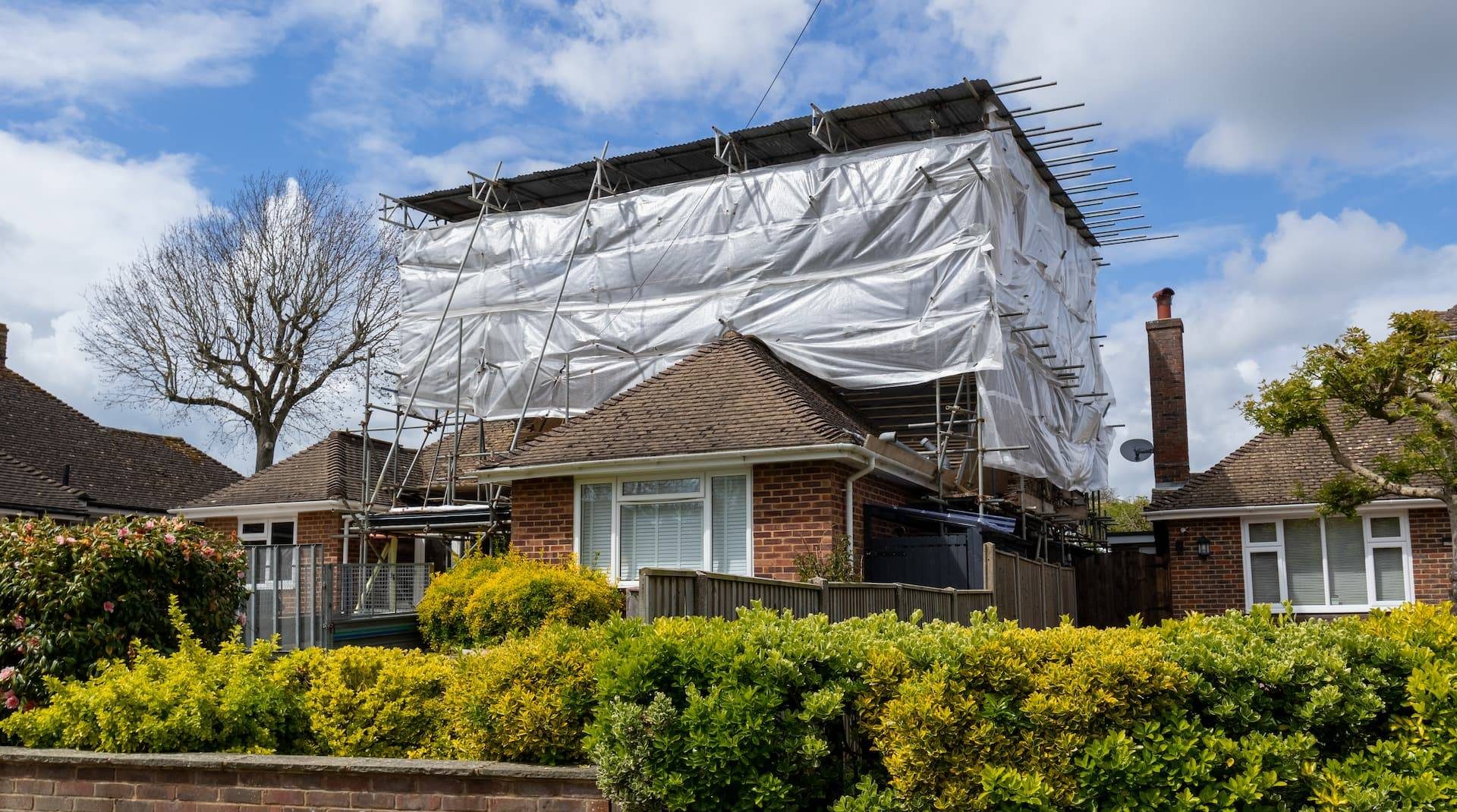 a house with scaffolding on it
